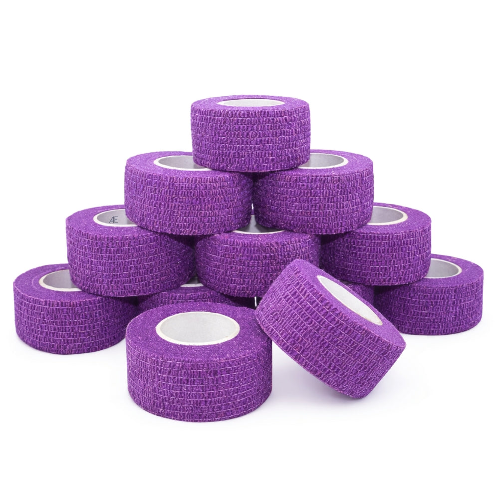Purple cohesive bandage rolls stacked on a white background